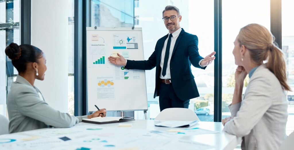 Presentation, financial meeting and business people in office, discussing chart, data and growth. L